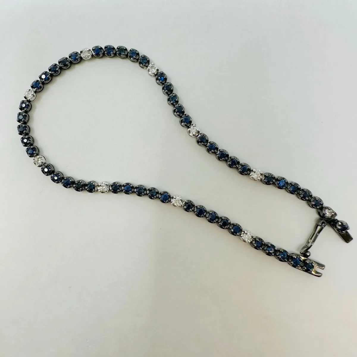 18K White Gold Tennis Bracelet with 51 Sapphires and 10 Diamonds