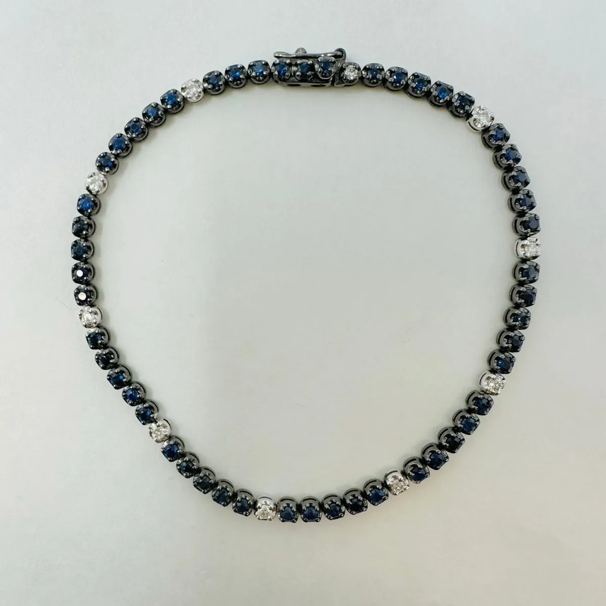 18K White Gold Tennis Bracelet with 51 Sapphires and 10 Diamonds