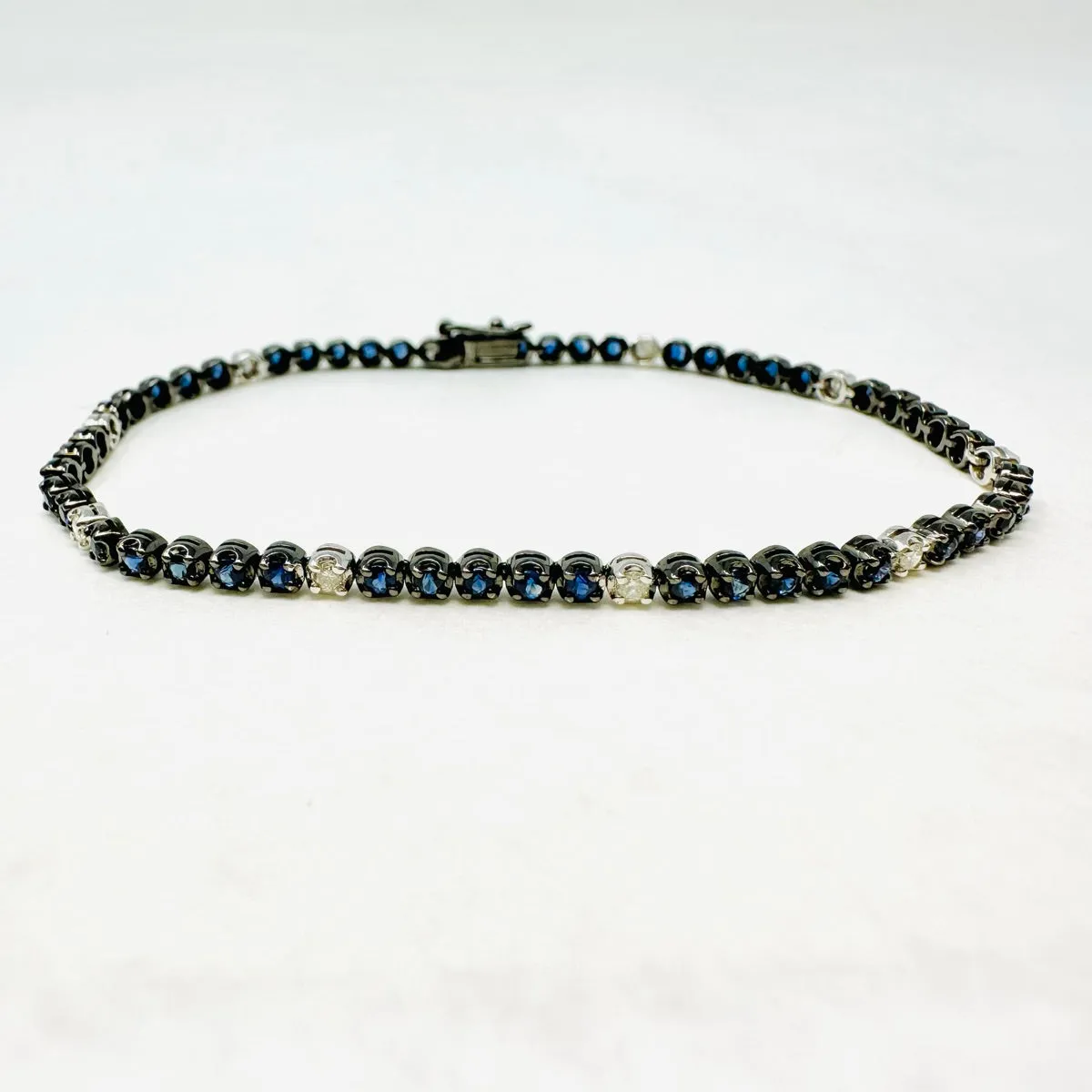 18K White Gold Tennis Bracelet with 51 Sapphires and 10 Diamonds