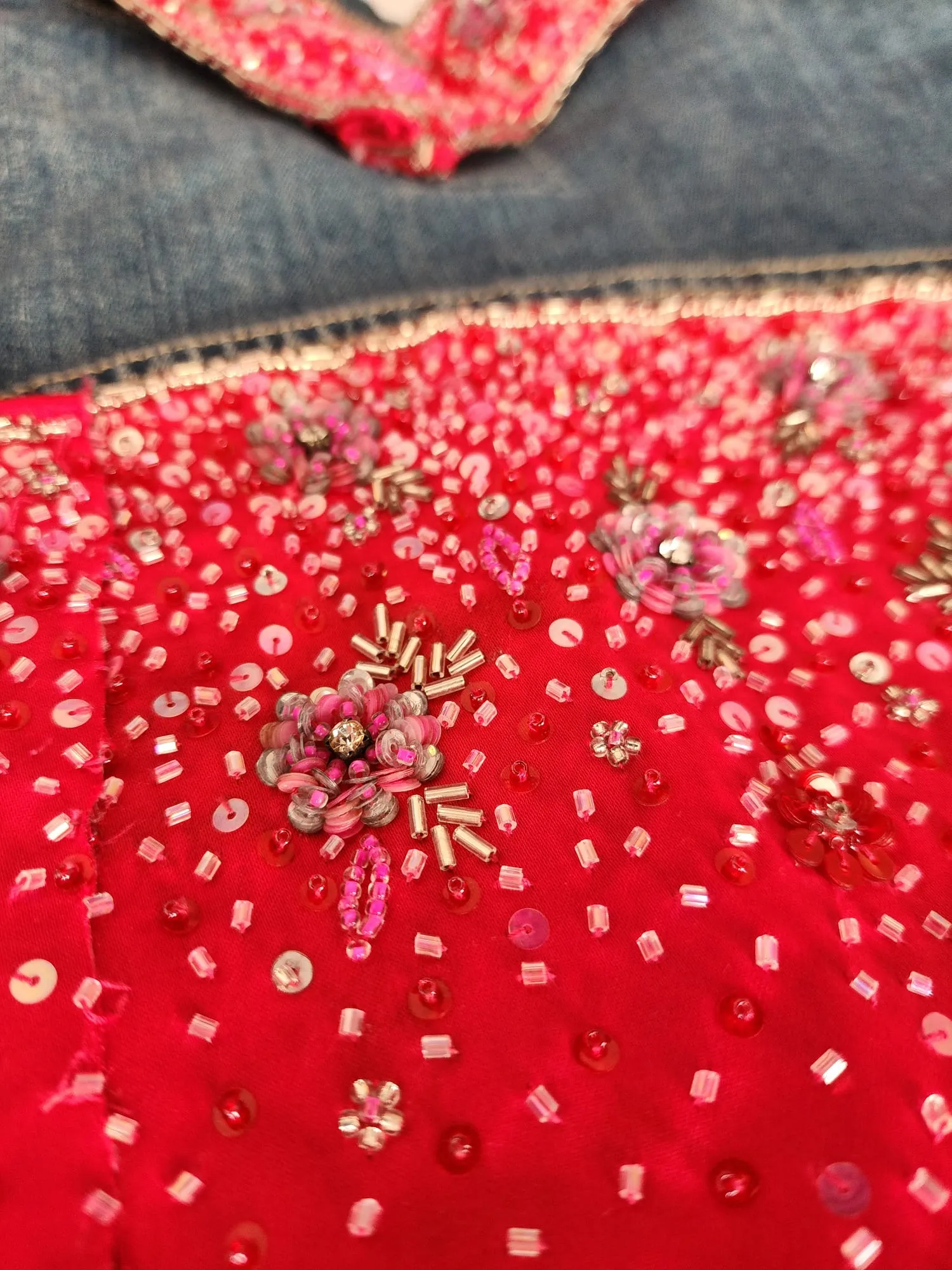 Upcycled Jean Jacket with Artisanal Beaded Flower Accents